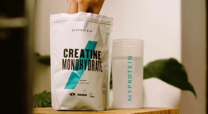 A close up of raw creatine monohydrate powder